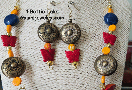 close up of chain and earrings