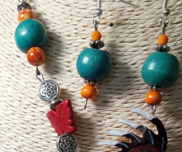 close up of chain and earrings