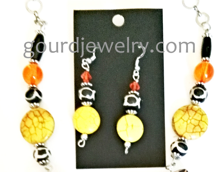 close up of chain and earrings