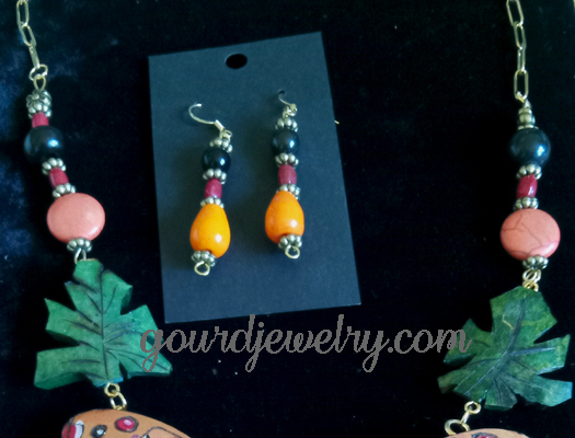 closeup of chain and earrings
